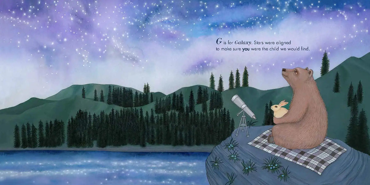 A page from A is for Always: An Adoption Alphabet showing a bear and rabbit stargazing by a lake under a starry sky.
