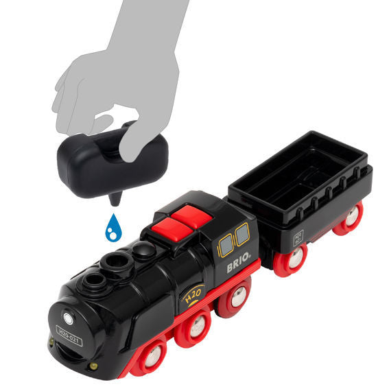 Hand refilling battery-operated black and red train engine for the Steaming Christmas Train Set with water load.