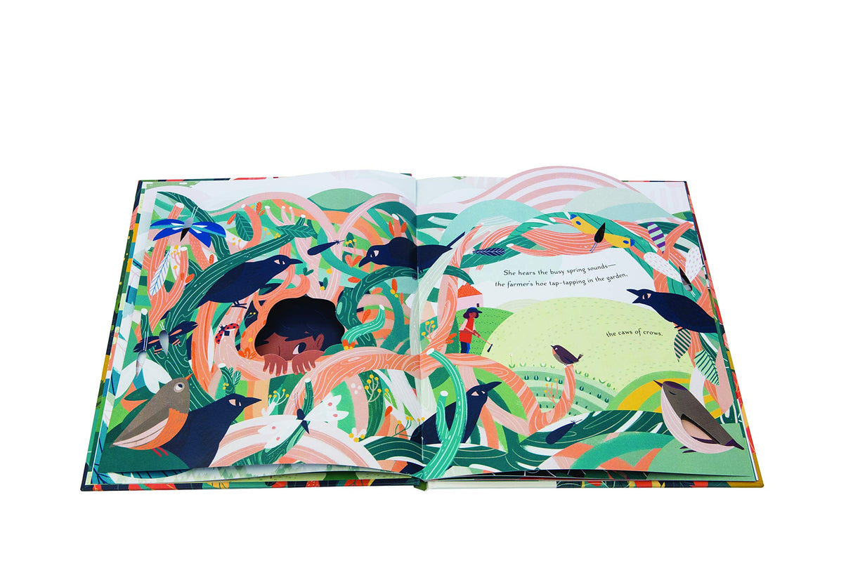 My Friend Earth open book showing colorful illustrations of animals and nature in a child-friendly style.