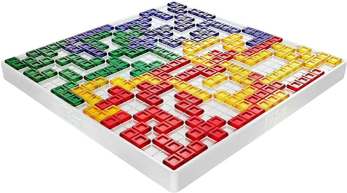Blokus strategy game board with colorful interlocking pieces placed by players aiming to block opponents and claim territory.