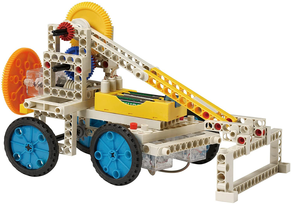 Remote Control Machines motorized crane model with blue wheels, yellow gears, and white construction pieces.
