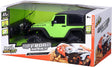 RC Jeep Wrangler Rubicon remote control car in green with large off-road tires, designed for rough terrain play.