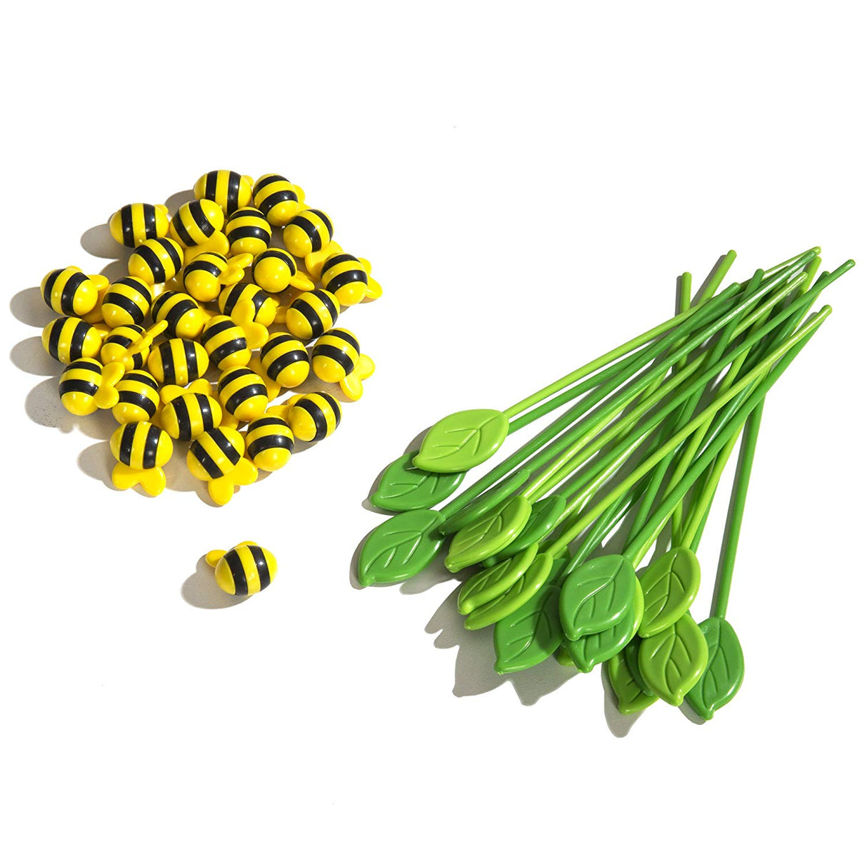 Honeybee Tree game pieces showing yellow bees and green plastic leaves for the stead hand game play.
