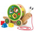 Pull Along Snail Sorter wooden toddler toy with removable shape sorter shell and colorful shapes for early learning.