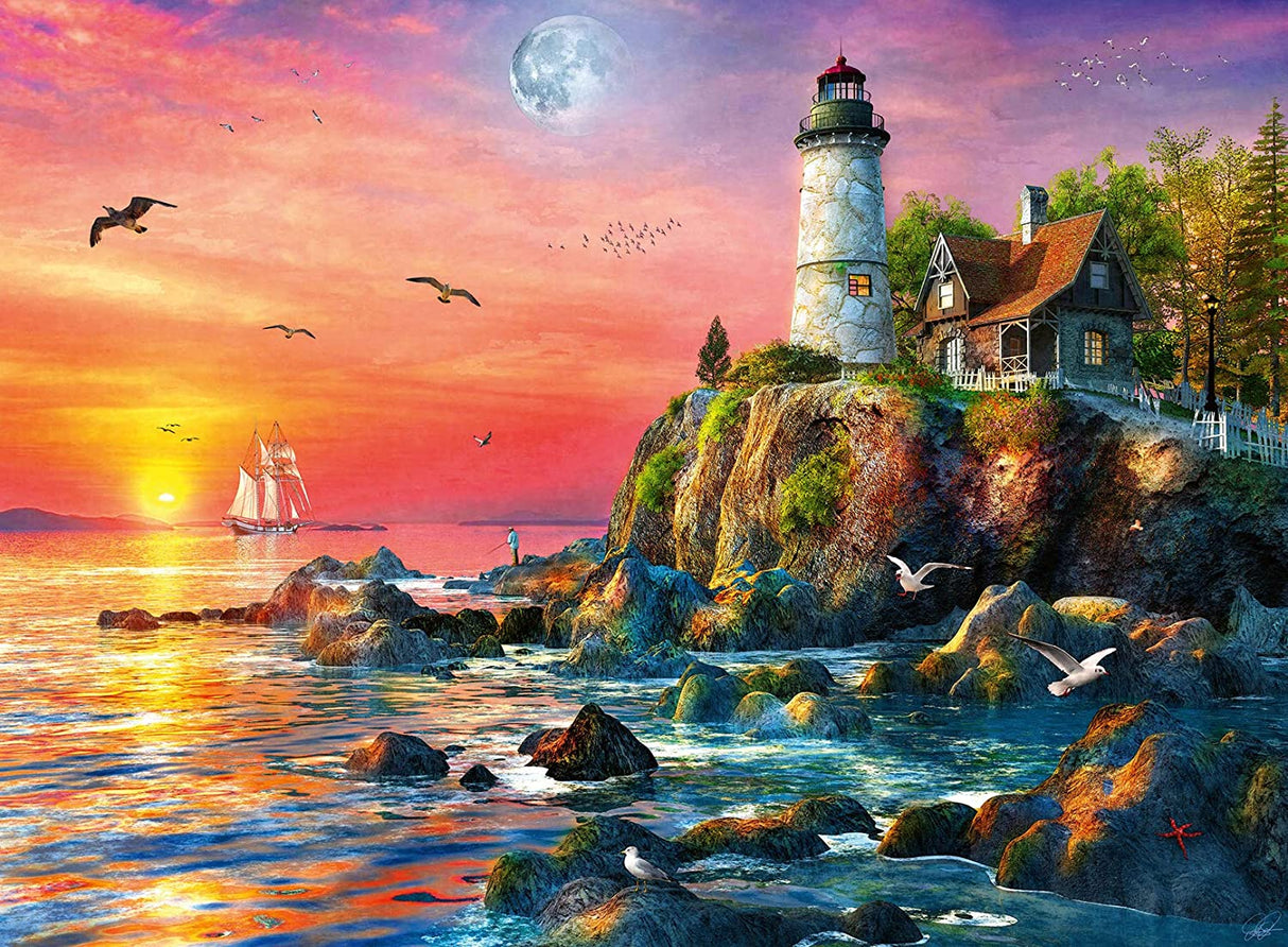 500pc Lighthouse at Sunset Puzzle shows a lighthouse, stone cottage, tall ship, and seagulls at colorful sunset by the sea.