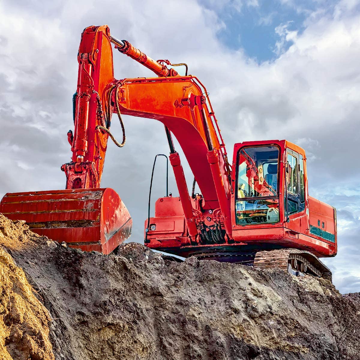 49pc Diggers at Work Puzzles featuring a bright red excavator digging earth under a partly cloudy sky.