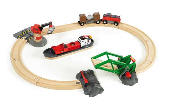 Cargo Harbor Set featuring a wooden train track, cargo ship, crane, and battery-operated train for imaginative play.