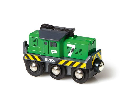 Battery-Powered Freight Engine green toy train with number 7 and black wheels on BRIO tracks for ages 3 and up