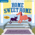 Indestructibles: Home Sweet Home book cover with dog and cat on porch steps and welcome mat in front of yellow house.