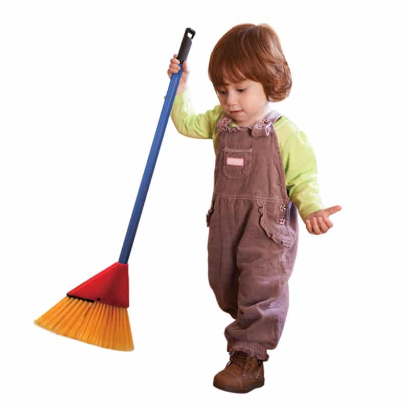 Child holding a colorful broom, demonstrating the fun and size of the Children's Broom Set for toddlers.