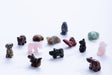 Carved Stone Animal assorted natural stone animal figures including dog, butterfly, penguin, turtle, and more designs.