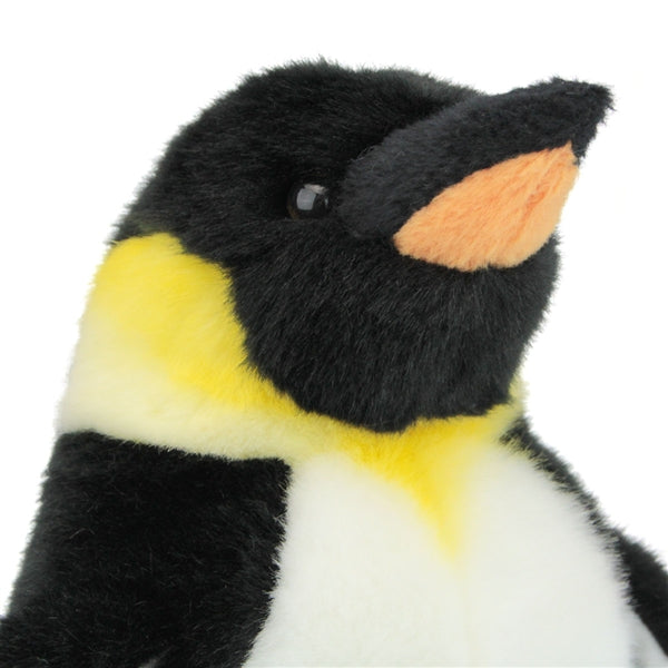 Close-up of Emperor Penguin Waddles plush toy showing soft fur and friendly face, perfect for ages 3 and up.