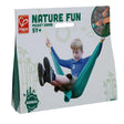 Child enjoying the Pocket Swing, a portable outdoor swing set designed for kids 5 years and up.