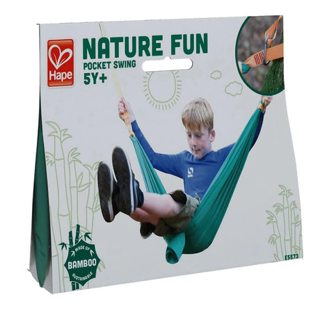 Child enjoying the Pocket Swing, a portable outdoor swing set designed for kids 5 years and up.