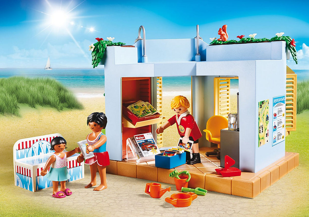 Family Fun | Campground playset with figures enjoying a beachside kiosk and camping activities under a sunny sky.