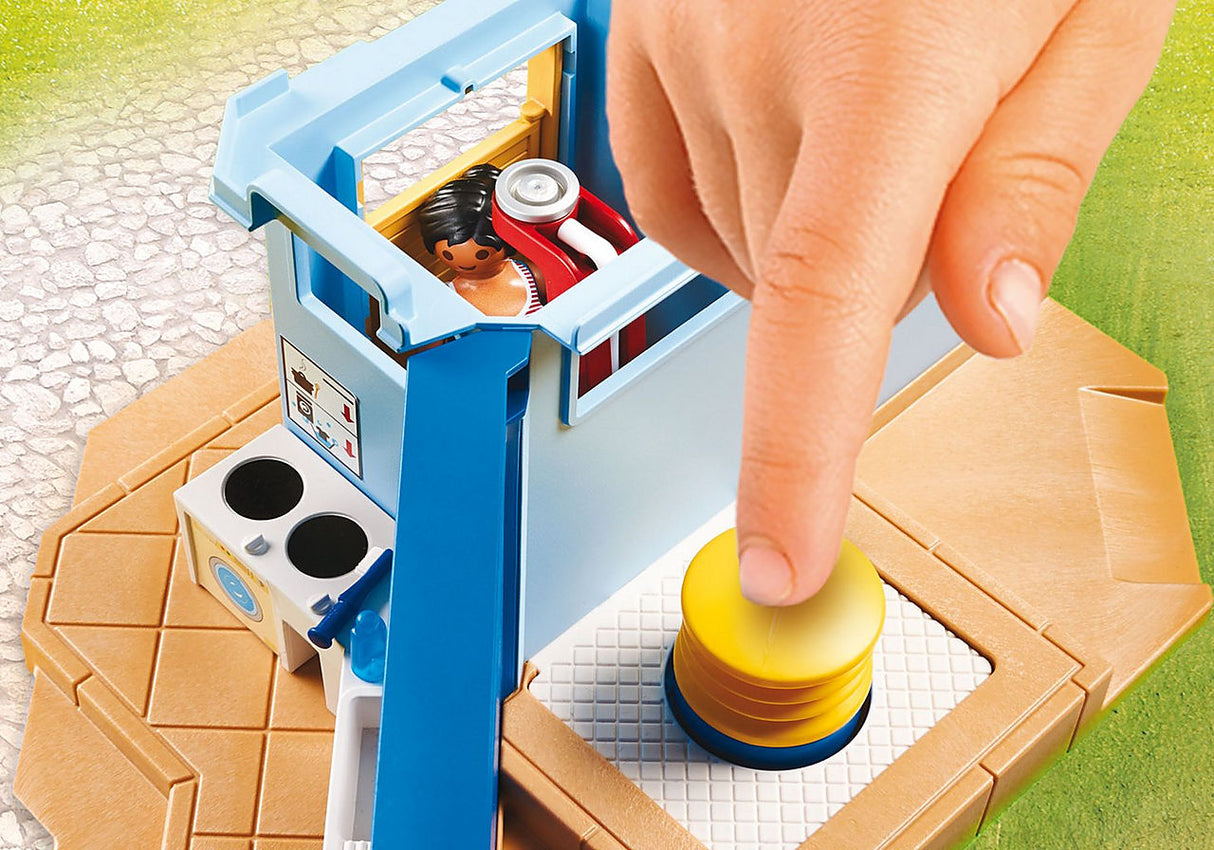 Family Fun | Campground with PLAYMOBIL figures playing at registration building and campsite accessories.