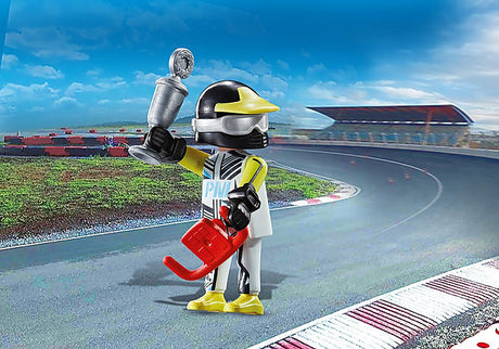 Playmo-Friends | Race Car Driver figure holding a trophy on racetrack, wearing helmet, cap, and driving gloves.