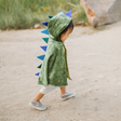 Baby Dragon Cape | Size 2-3 shown on child wearing a soft green crushed velvet cape with foam spikes and Velcro closure.