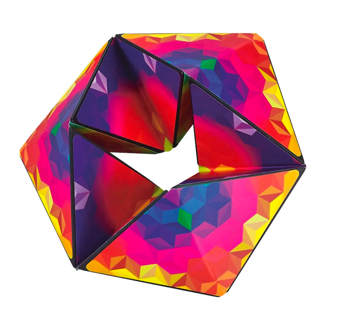 Karmagami fidget toy showing vibrant colorful kaleidoscope design, perfect for calming and endless flipping fun.