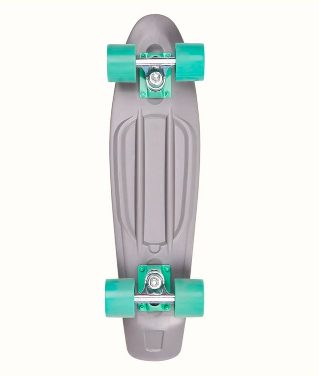 Quip Mini Cruiser Skateboard Shark with teal wheels and gray deck, lightweight and portable for easy commuting.
