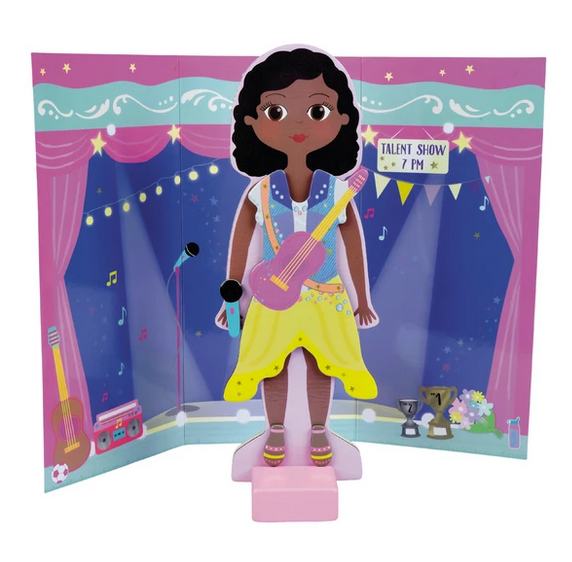 Magnetic Dress Up | Zoey wooden doll with guitar on reversible talent show backdrop and magnetic outfit pieces.