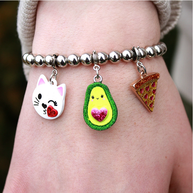 Glitter Avocado Charm hanging on a silver bead bracelet with cat and pizza charms, 3D enamel with glitter details.
