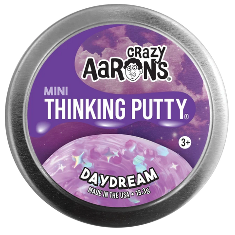 Mini Trendsetters Daydream Thinking Putty in translucent lavender with sparkles and stars in a metal tin.