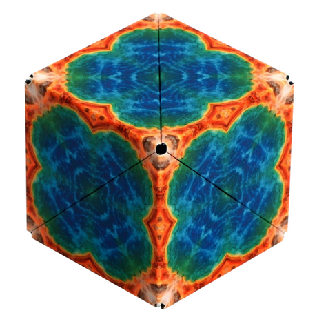 Shashibo | Earth magnetic puzzle cube with vibrant blue, green, and orange geometric patterns on recyclable plastic.