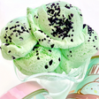 Mint Chip Ice Cream Slime scoops in a glass dish, showing realistic texture and mint chocolate chip details.