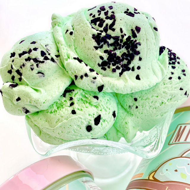 Mint Chip Ice Cream Slime scoops in a glass dish, showing realistic texture and mint chocolate chip details.