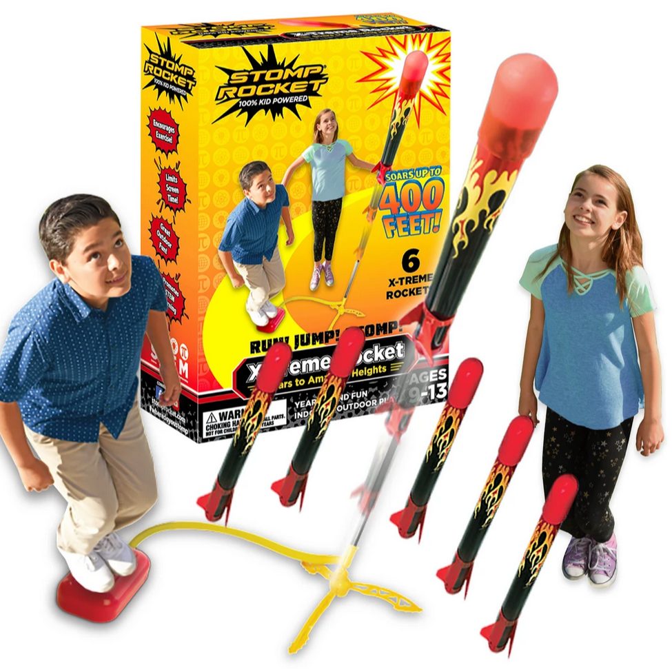 Stomp Rocket X-Treme! with kids launching rockets soaring up to 400 feet for outdoor fun and play.