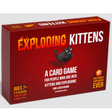 Exploding Kittens: Original Edition card game box with fiery title and angry kitten illustration for ages 7 and up.