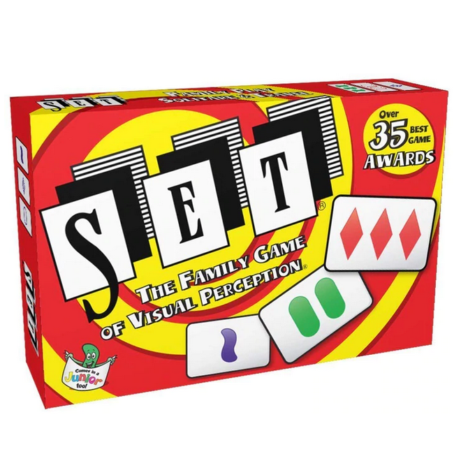 Set family game box with colorful cards showing shapes and numbers on a bright red and yellow background.