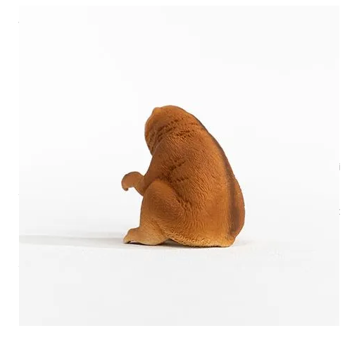 Slow Loris figurine showing soft textured brown body from behind on a white background.