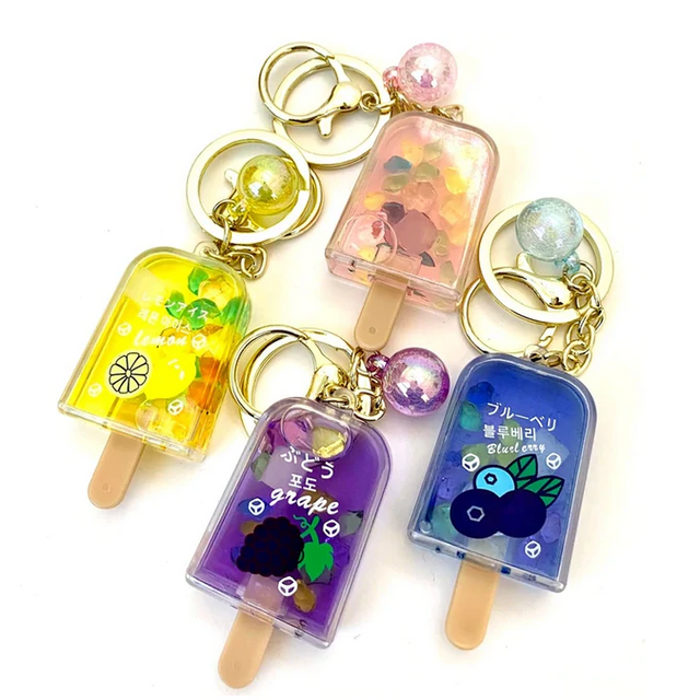 Fruit Popsicle Keychain set with lemon, grape, blueberry, and colorful confetti designs key rings and clips.