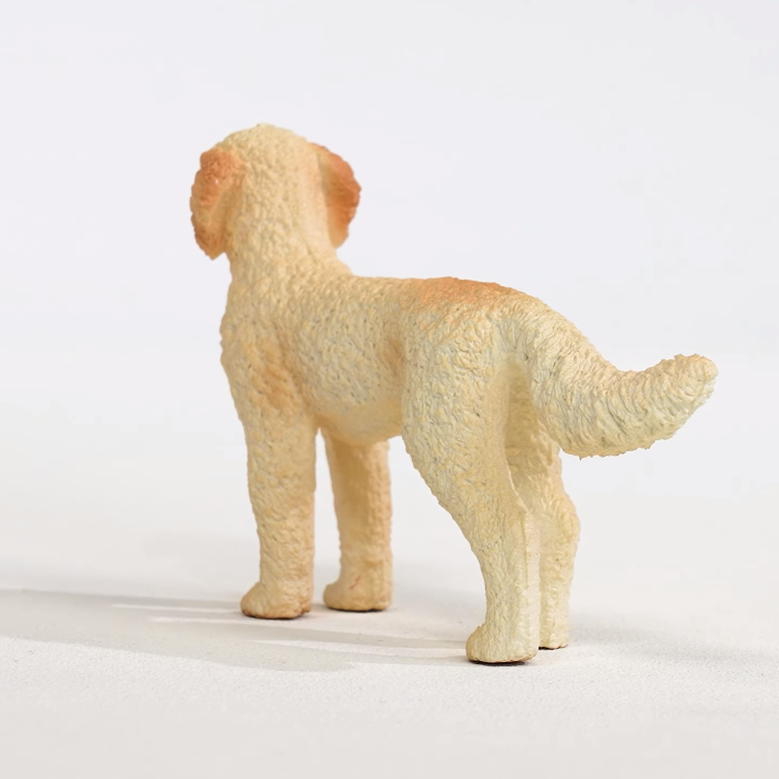 Goldendoodle figurine toy showing fluffy cream-colored dog standing, perfect for kids aged 3 and up.