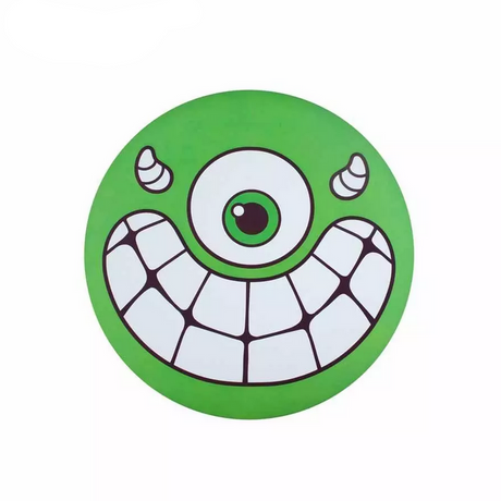 Waboba Super Flying Head foldable silicone disc with a green one-eyed monster face for outdoor play.