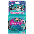 Glowbrights Mermaid Tail Thinking Putty in purple and turquoise shimmer glows sea green in the dark in a tin packaging.