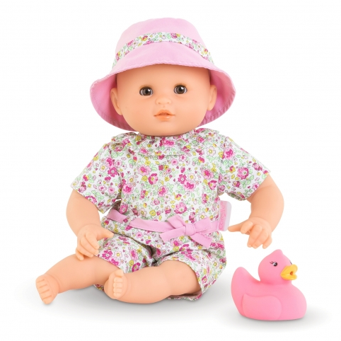 Bath Baby Coralie doll wearing floral outfit and pink hat with matching rubber duck bath toy for water play.