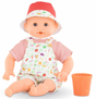 Bath Baby Calypso Garden doll wearing striped shirt and printed overalls with matching hat and orange cup accessory.