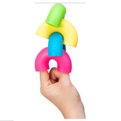 Hand holding colorful stretchy giant macaroni noodles toy in pink, blue, yellow, and green NeeDoh Mac n Squeeze