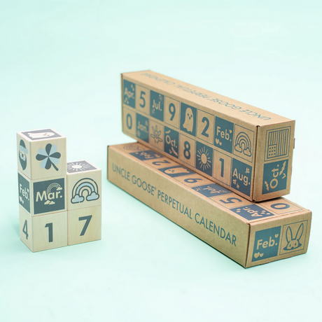 Perpetular Calendar Blocks wooden cubes show months, dates, weather, and holiday icons for educational fun.