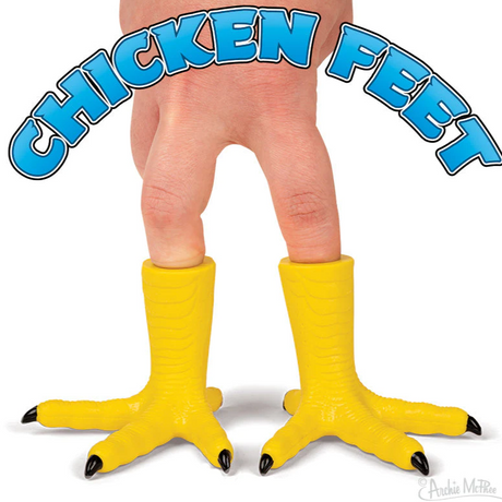 Chicken Foot soft vinyl finger puppet shown on fingers mimicking yellow chicken feet claws.