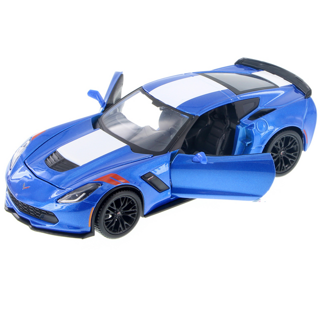 Blue Chevrolet Corvette Grand Sport 1:24 scale diecast model with openable doors and hood, detailed interior, and racing stripes.
