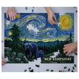 1000pc NH Starry Night Puzzle featuring a New Hampshire night sky with bears and pine trees being assembled.
