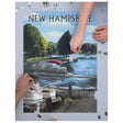 1000pc NH Pontoon & Lake Puzzle showing a scenic New Hampshire lake with pontoon boats in progress assembly.