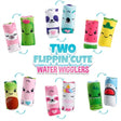 Two Flippin' Cute Water Wiggler reversible plush fidget toys with colorful animal and fruit designs, 5 inches each.
