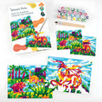 Paint by Number Dino & Dragon kit with preprinted canvases, paints, and brushes for colorful dinosaur and dragon scenes.