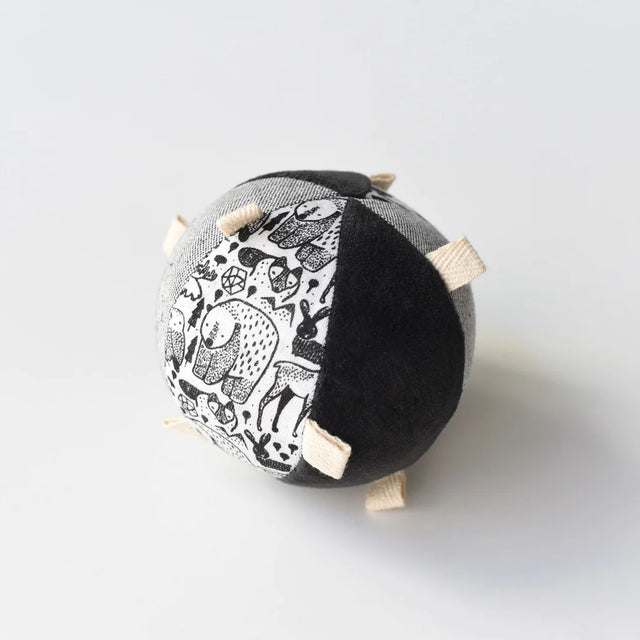 Organic Taggy Ball | Nordic sensory toy with black and white animal prints, organic cotton, and tactile tags for babies.