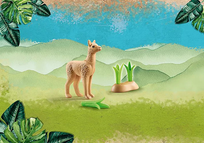 Wiltopia Baby Alpaca figure with greenery on a colorful landscape background for kids' eco-friendly play.